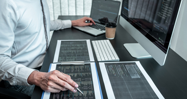 Developer programmer working on coding program software computer